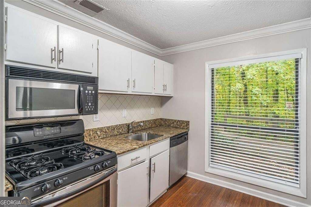 2 bedroom, 2 bathroom, 1,241 sq ft condominium for sale at 1307 Cumberland Court, Smyrna, GA 30080 — photo 5