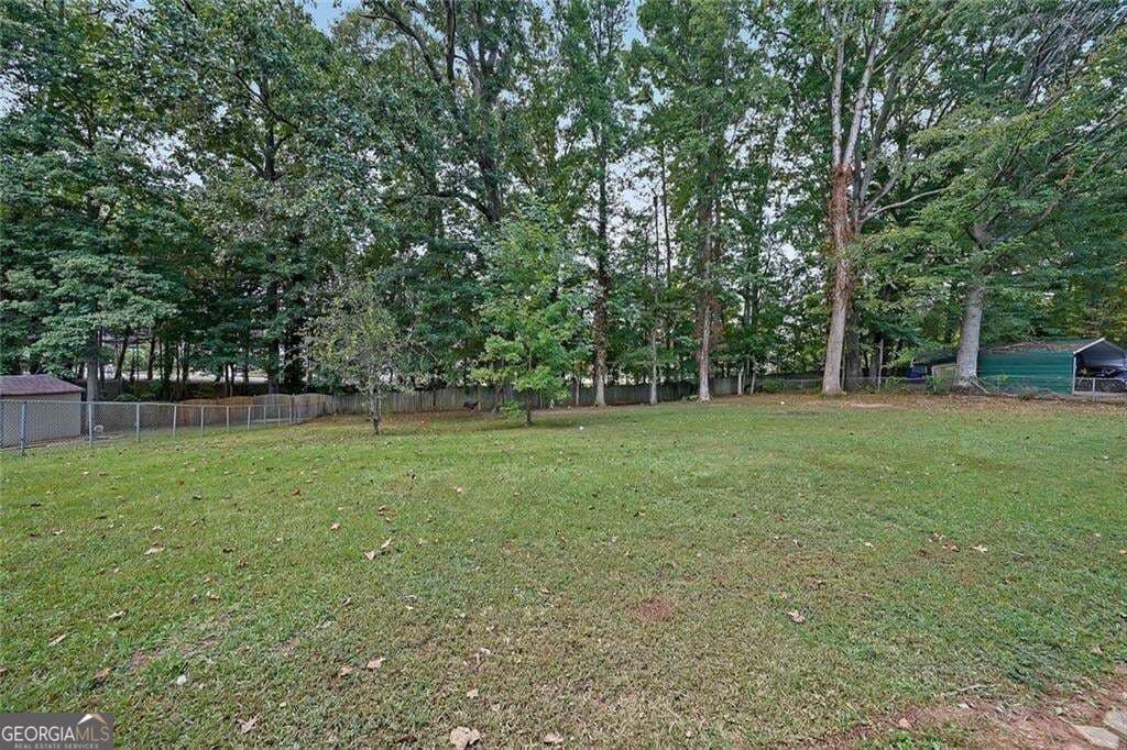 5 bedroom, 3 bathroom, 1,632 sq ft single family residence for sale at 773 Rebecca Street, Lilburn, GA 30047 — photo 6