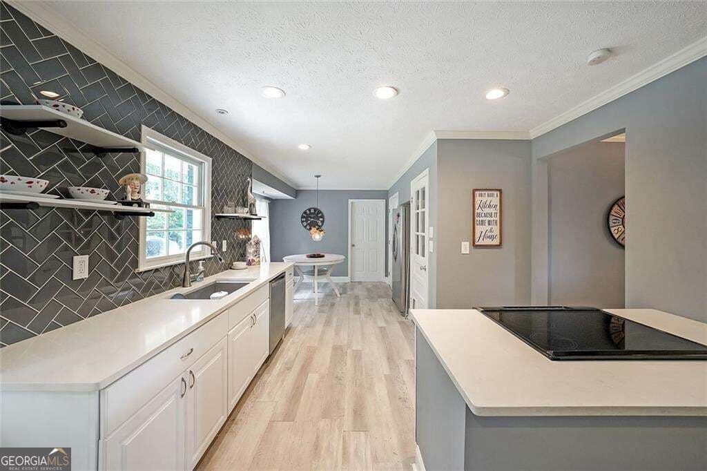5 bedroom, 3 bathroom, 1,632 sq ft single family residence for sale at 773 Rebecca Street, Lilburn, GA 30047 — photo 4