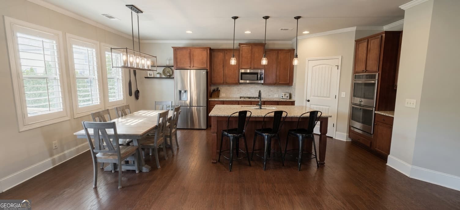 5 bedroom, 4 bathroom, 3,596 sq ft single family residence for sale at 5420 Chestnut Drive, Cumming, GA 30040 — photo 6