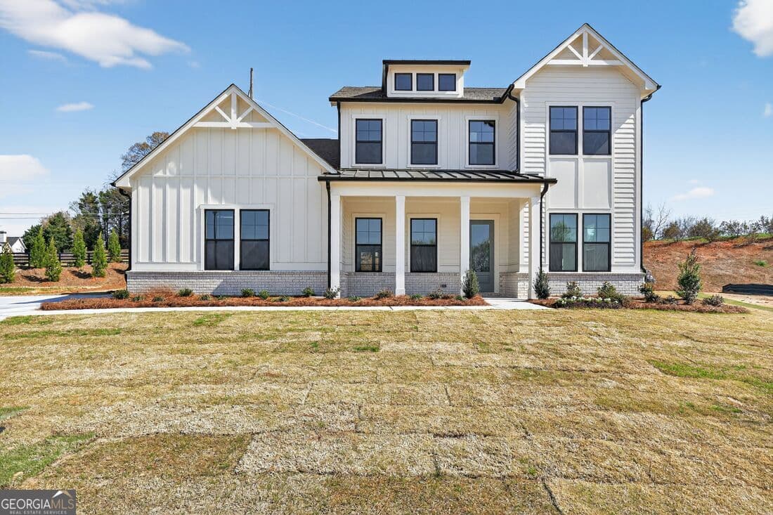 5 bedroom, 4.5 bathroom, 4,244 sq ft single family residence for sale at 5065 Denning Lane, Cumming, GA 30040 — photo 6