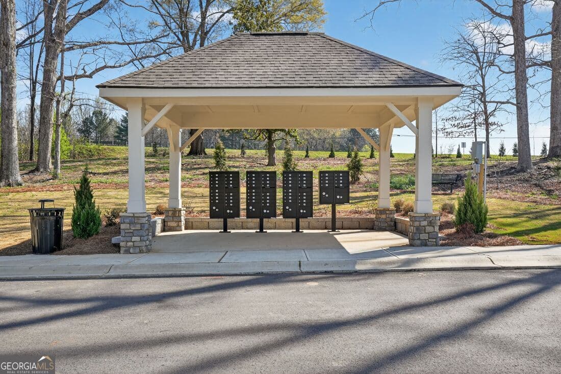 5 bedroom, 4.5 bathroom, 4,244 sq ft single family residence for sale at 5065 Denning Lane, Cumming, GA 30040 — photo 3