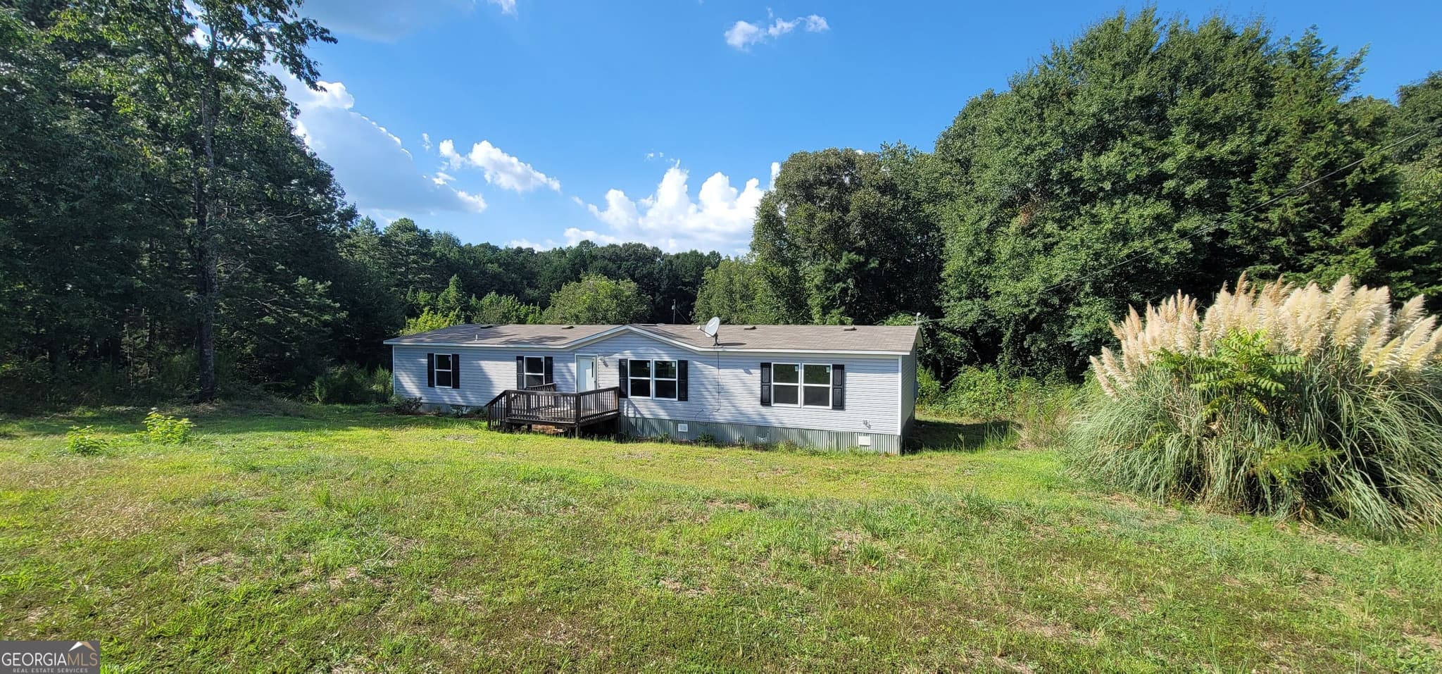 4 bedroom, 2 bathroom, 1,904 sq ft manufactured home,single family residence for sale at 136 Bud Freeman Road, Royston, GA 30662 — photo 2