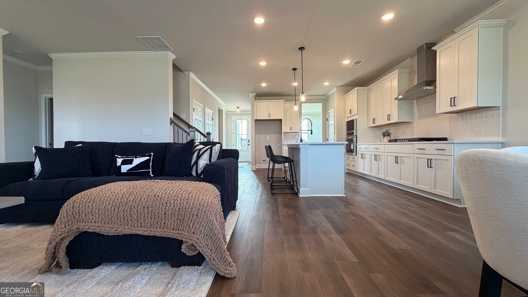 4 bedroom, 3.5 bathroom, 2,486 sq ft single family residence for sale at 551 Grand Wehunt Drive, Hoschton, GA 30548 — photo 4