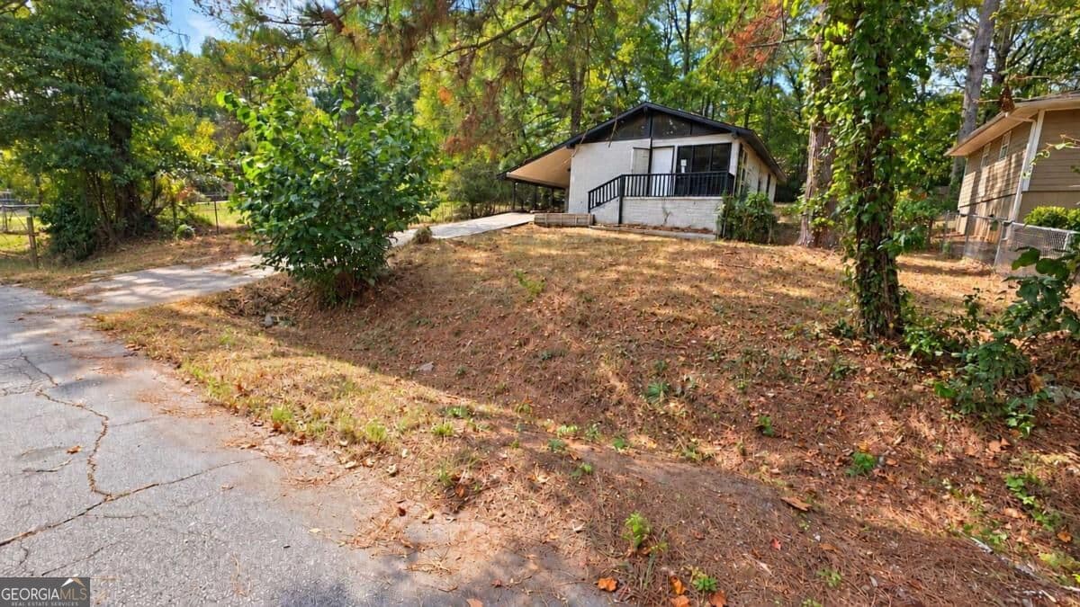 3 bedroom, 1 bathroom, 1,056 sq ft single family residence for sale at 9184 Blackwell Street, Covington, GA 30014 — photo 2