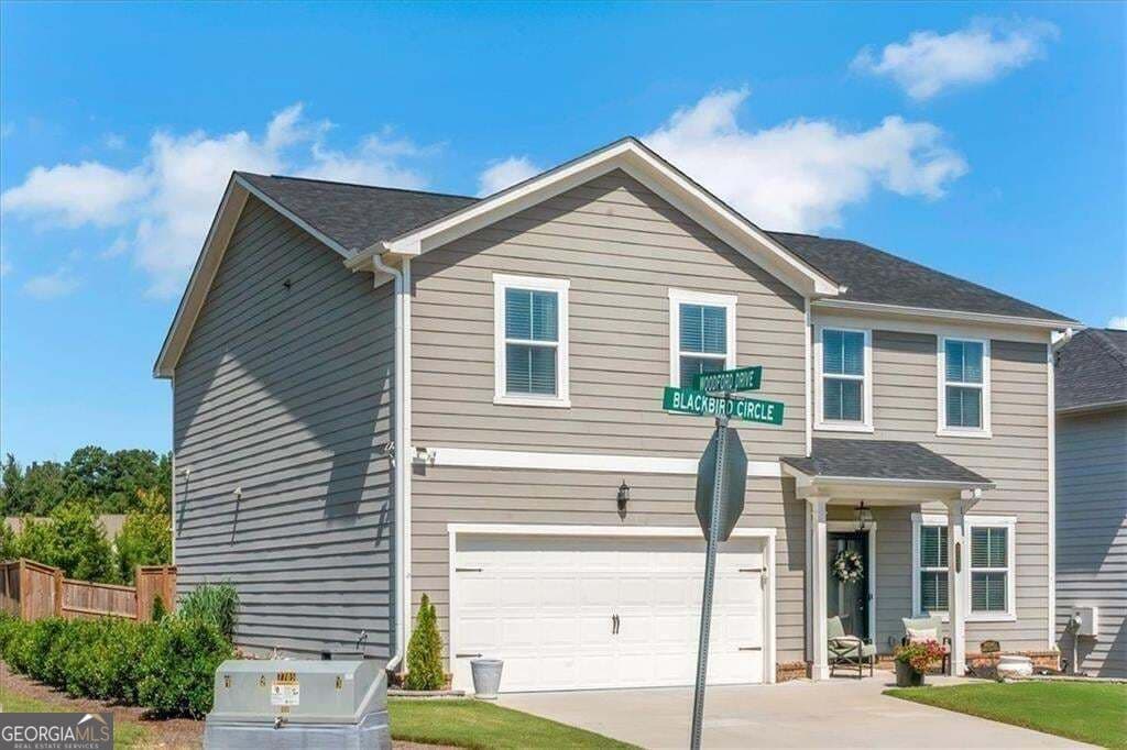 5 bedroom, 3 bathroom, 2,691 sq ft single family residence for sale at 2131 BLACKBIRD Circle, Covington, GA 30016 — photo 3