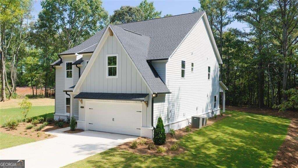 5 bedroom, 4.5 bathroom, 3,145 sq ft single family residence for sale at 5716 Stephens Road, Flowery Branch, GA 30542 — photo 3