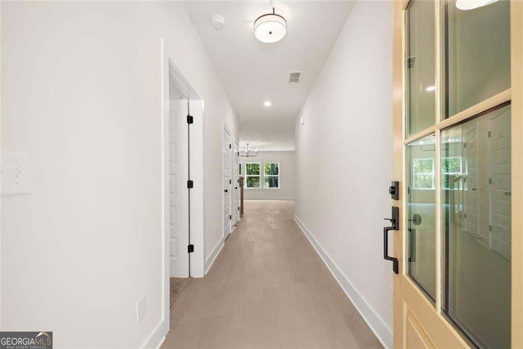 5 bedroom, 4.5 bathroom, 3,145 sq ft single family residence for sale at 5716 Stephens Road, Flowery Branch, GA 30542 — photo 4