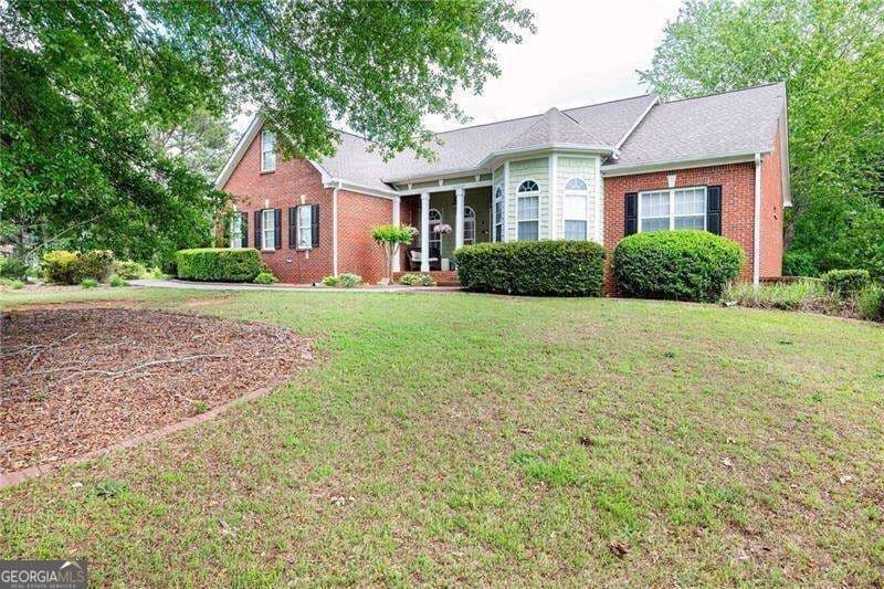 4 bedroom, 3.5 bathroom, 2,360 sq ft single family residence for sale at 1510 Pecan Plantation Court, Loganville, GA 30052