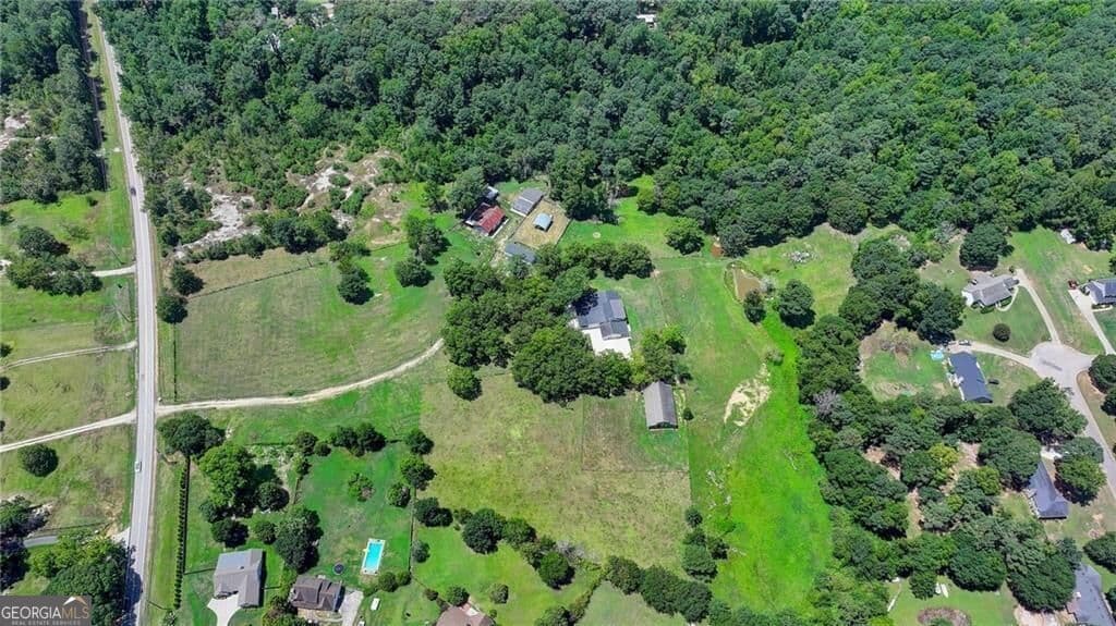 4 bedroom, 3.5 bathroom, 5,686 sq ft single family residence for rent at 3601 Youth Monroe Road, Loganville, GA 30052 for $4,500 a month — photo 6