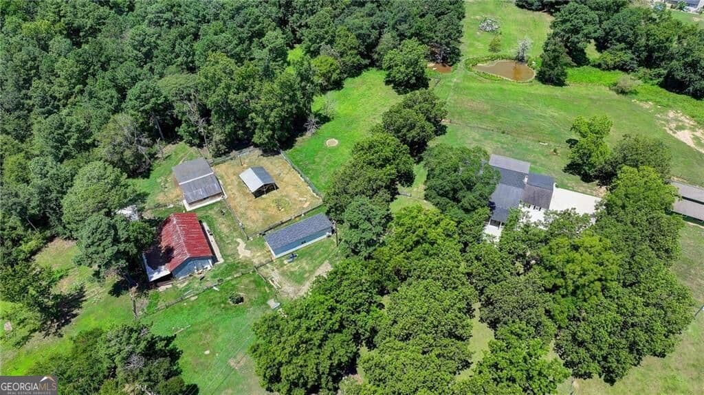 4 bedroom, 3.5 bathroom, 5,686 sq ft single family residence for rent at 3601 Youth Monroe Road, Loganville, GA 30052 for $4,500 a month — photo 3