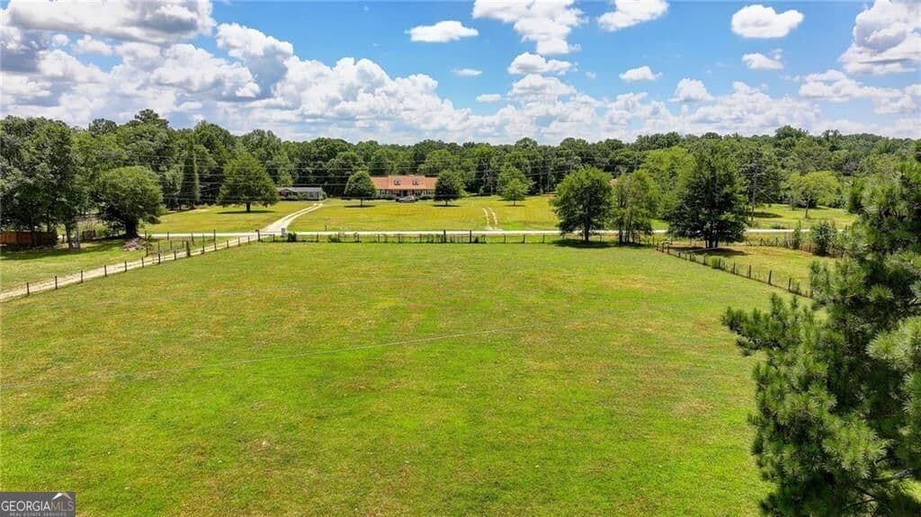 4 bedroom, 3.5 bathroom, 5,686 sq ft single family residence for rent at 3601 Youth Monroe Road, Loganville, GA 30052 for $4,500 a month — photo 9
