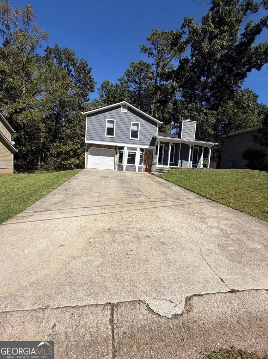 3 bedroom, 2 bathroom, 1,530 sq ft single family residence for sale at 64 Timothy Lane, Lilburn, GA 30047 — photo 1 of 23
