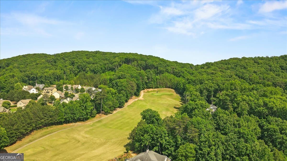 4 bedroom, 4.5 bathroom, 4,686 sq ft single family residence for sale at 6415 E Hills Court, Cumming, GA 30041 — photo 2