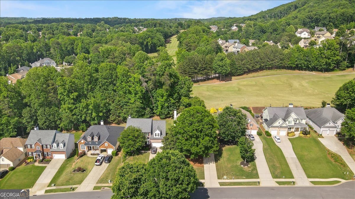4 bedroom, 4.5 bathroom, 4,686 sq ft single family residence for sale at 6415 E Hills Court, Cumming, GA 30041 — photo 3