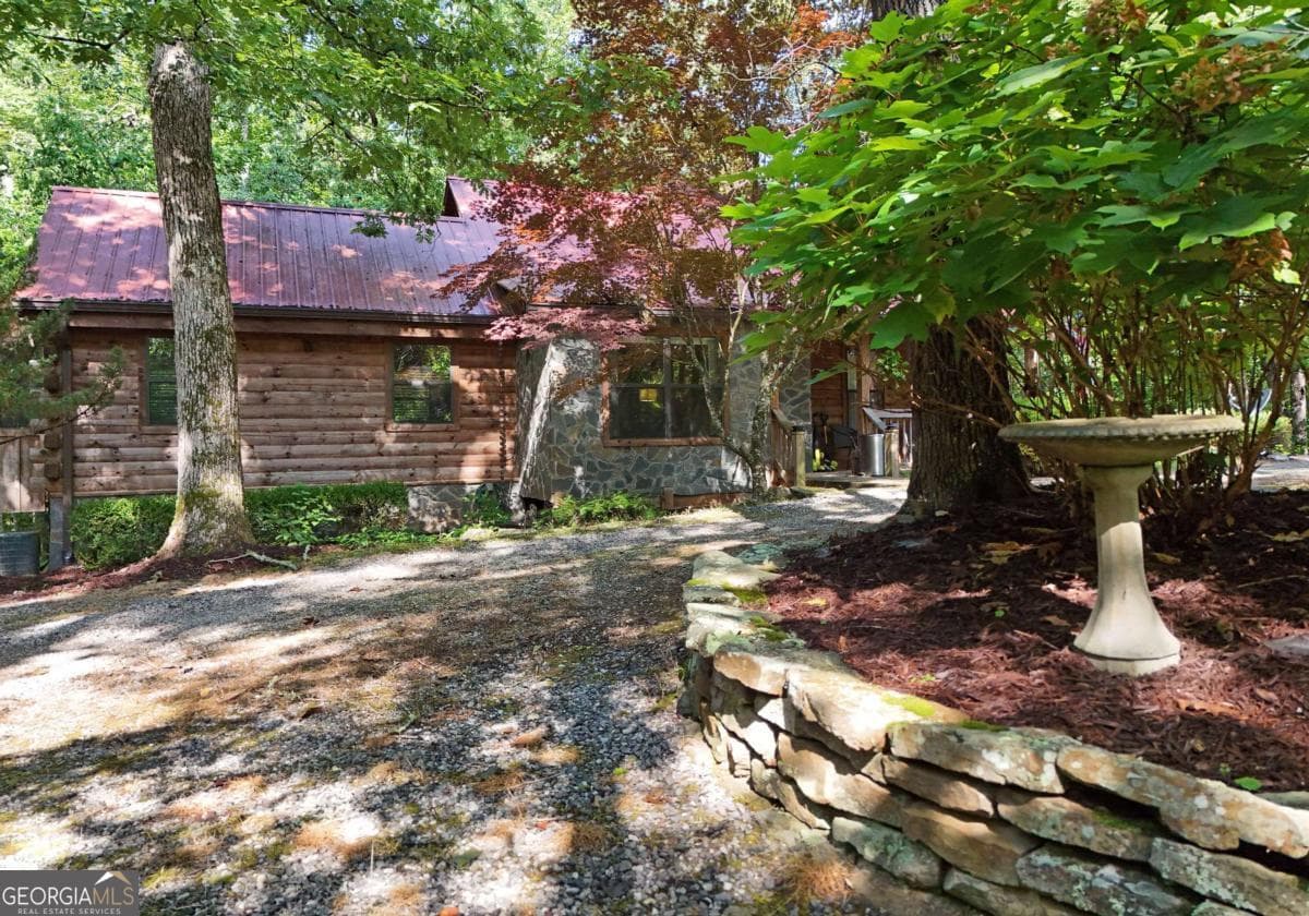 3 bedroom, 2.5 bathroom cabin,single family residence for sale at 566 Sharewood Forest, Morganton, GA 30560 — photo 5