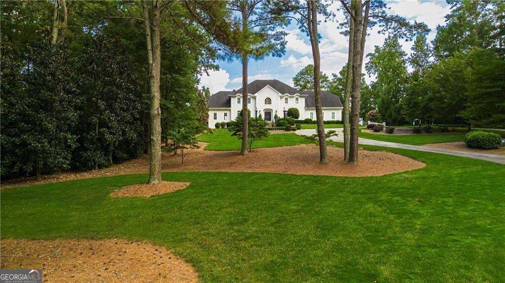 6 bedroom, 5.5 bathroom, 8,801 sq ft single family residence for sale at 1985 Birmingham Road, Alpharetta, GA 30004 — photo 9