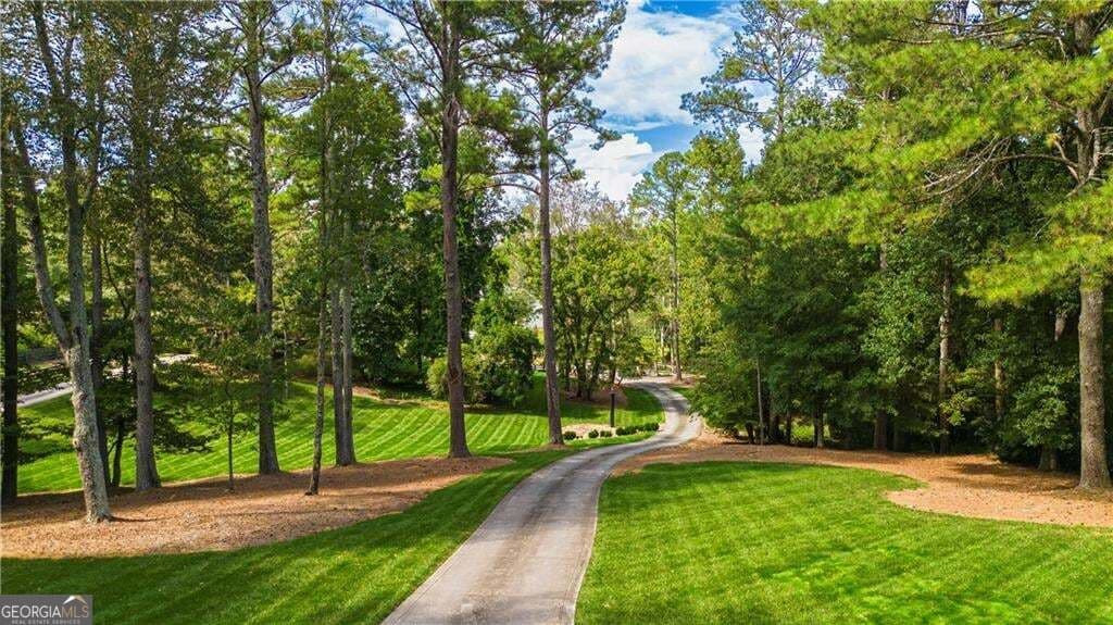 6 bedroom, 5.5 bathroom, 8,801 sq ft single family residence for sale at 1985 Birmingham Road, Alpharetta, GA 30004 — photo 10