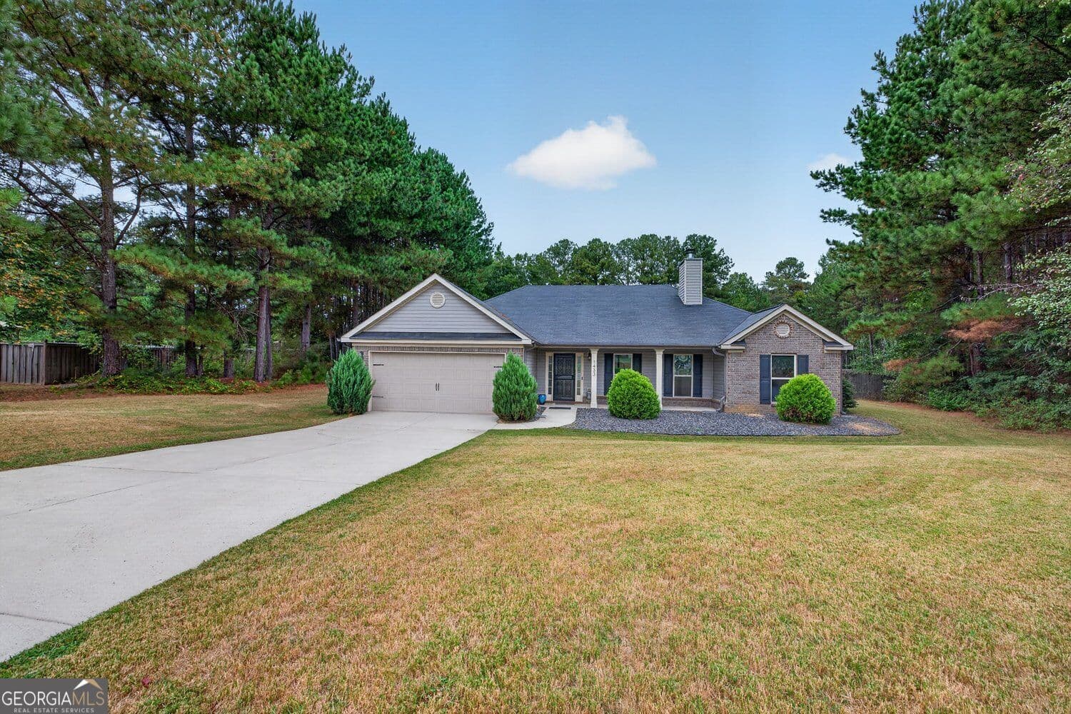 4 bedroom, 3 bathroom, 2,232 sq ft single family residence for sale at 1433 Palmer Drive, Monroe, GA 30656 — photo 4