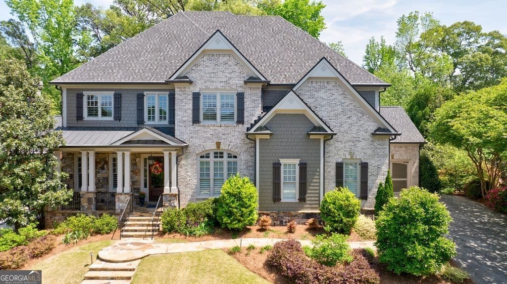 6 bedroom, 5.5 bathroom, 6,628 sq ft single family residence sold at 5266 Creek Walk Circle, Peachtree Corners, GA 30092