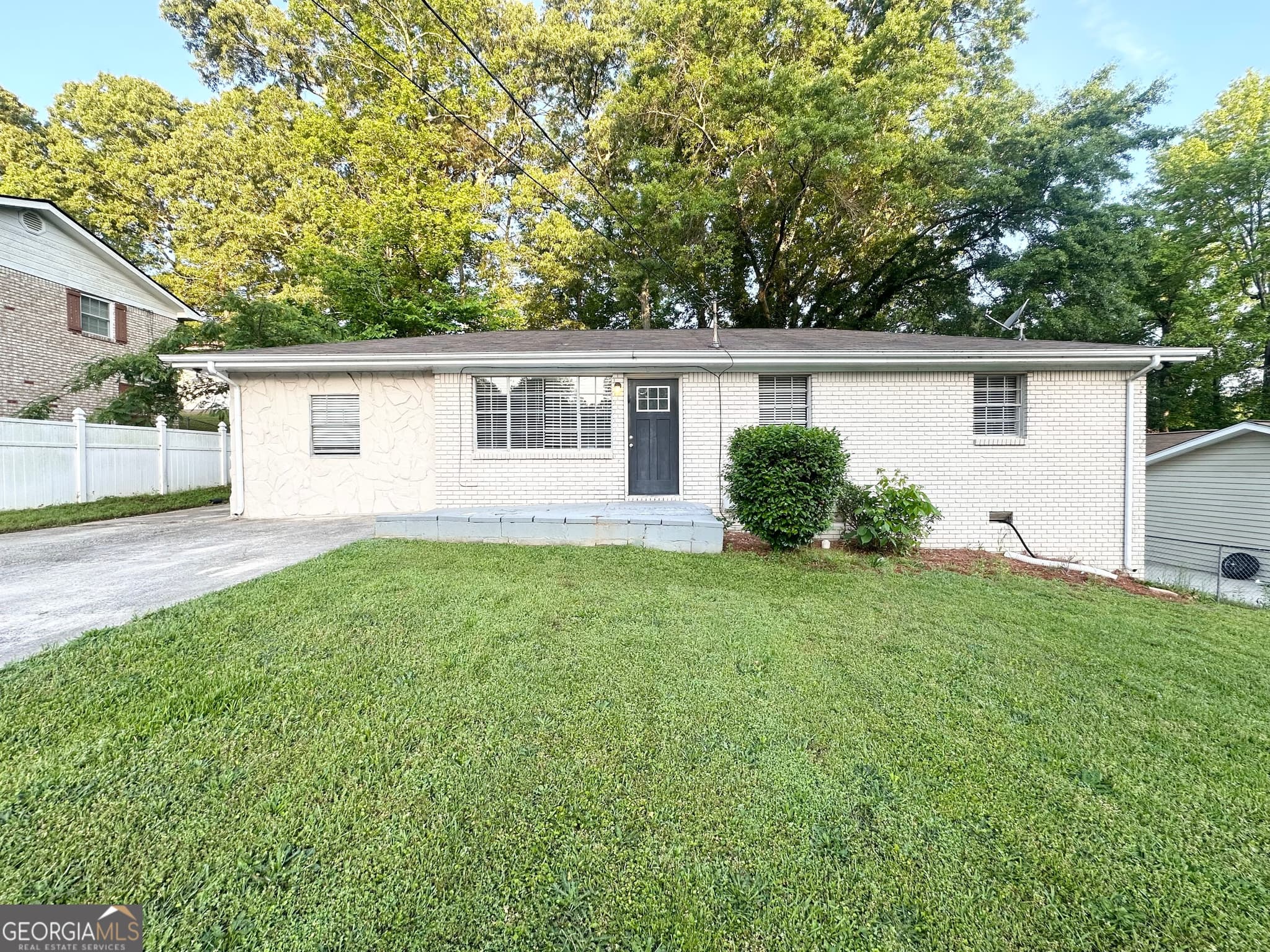 4 bedroom, 1 bathroom, 1,352 sq ft single family residence for sale at 6309 Wellington Way, Austell, GA 30106 — photo 2