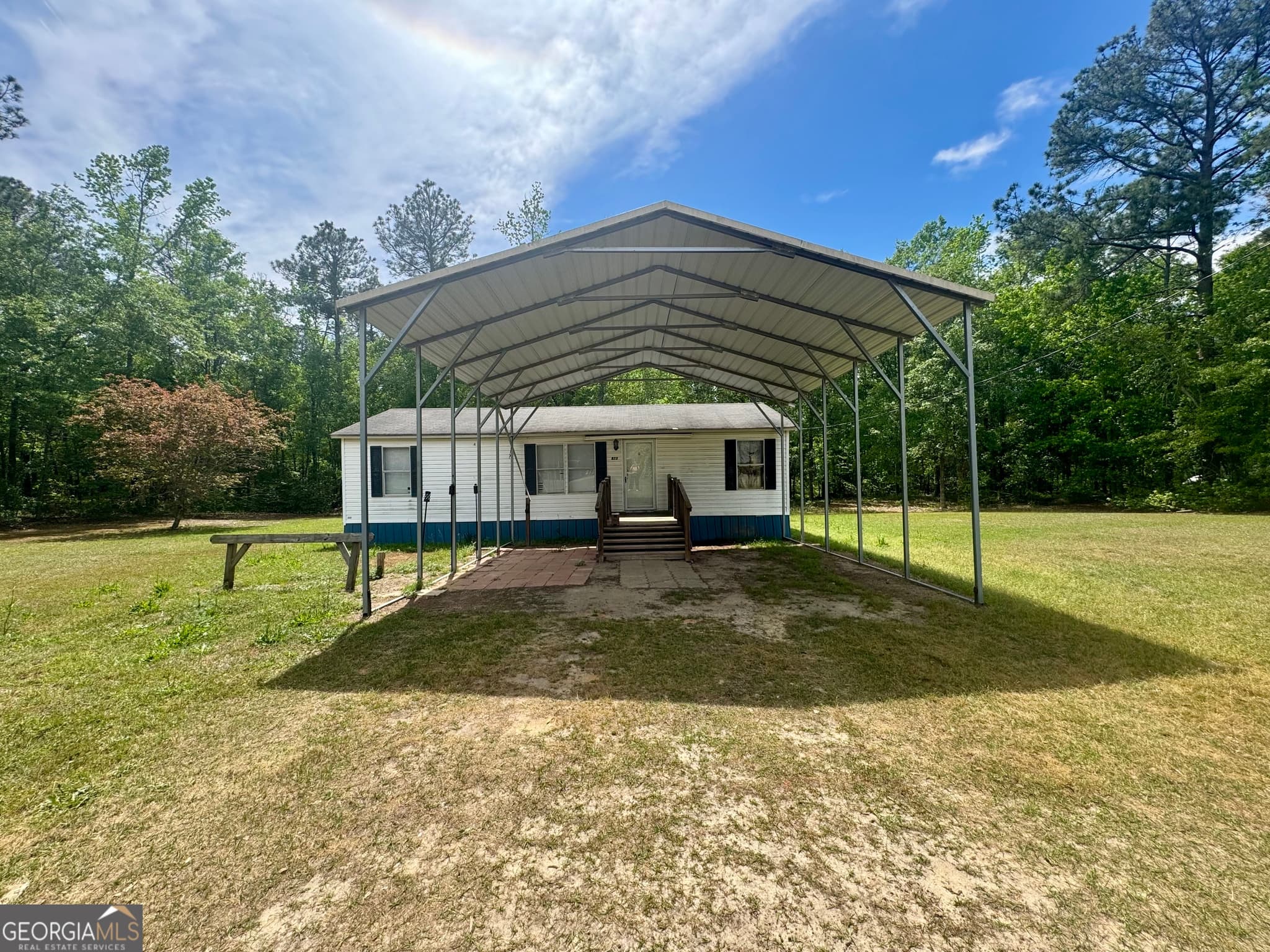 3 bedroom, 2 bathroom, 1,056 sq ft manufactured home,single family residence for sale at 877 W Rushing Road, Register, GA 30452 — photo 2
