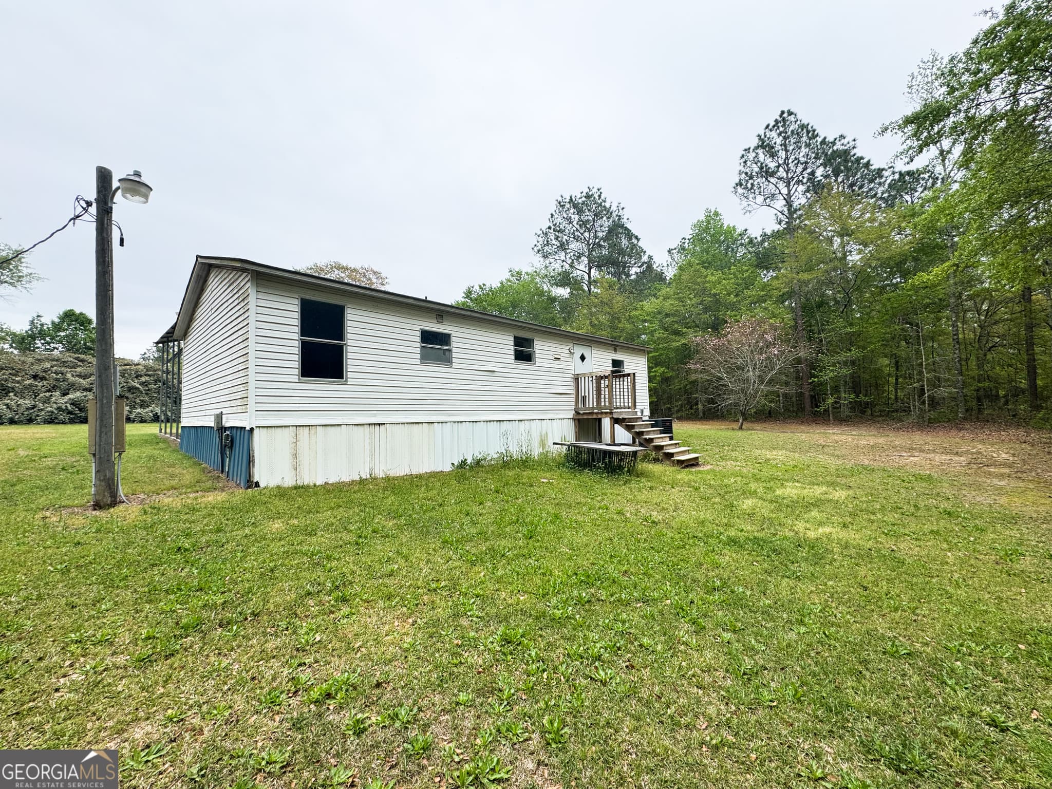 3 bedroom, 2 bathroom, 1,056 sq ft manufactured home,single family residence for sale at 877 W Rushing Road, Register, GA 30452 — photo 7