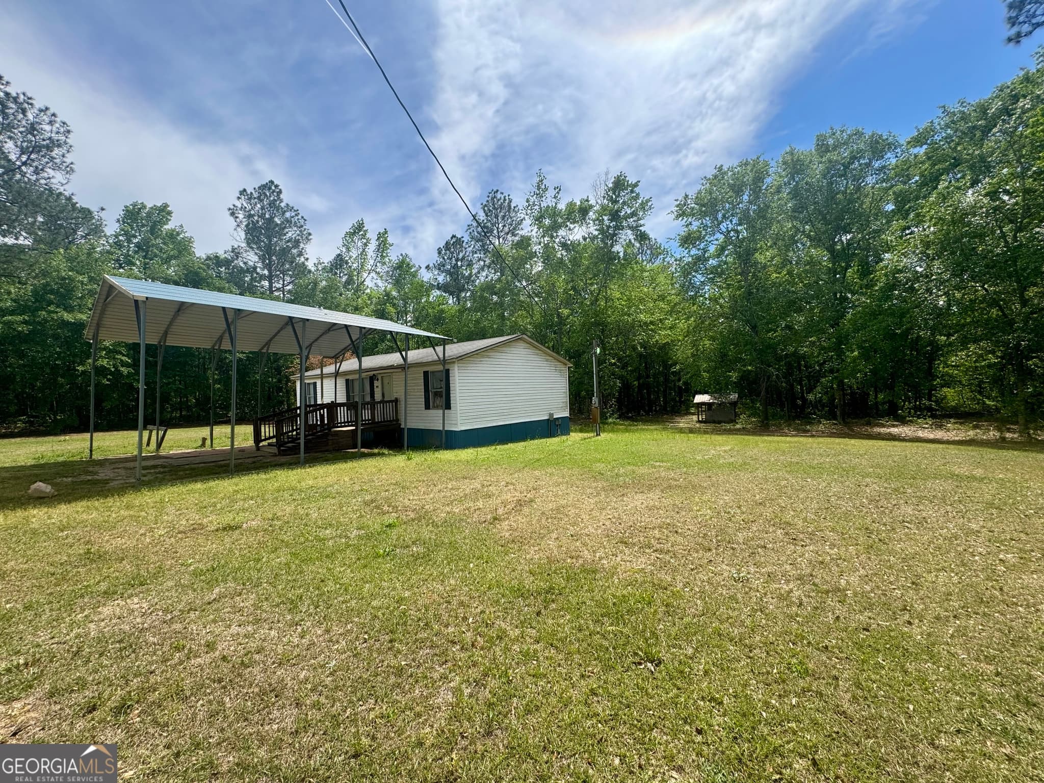 3 bedroom, 2 bathroom, 1,056 sq ft manufactured home,single family residence for sale at 877 W Rushing Road, Register, GA 30452 — photo 3
