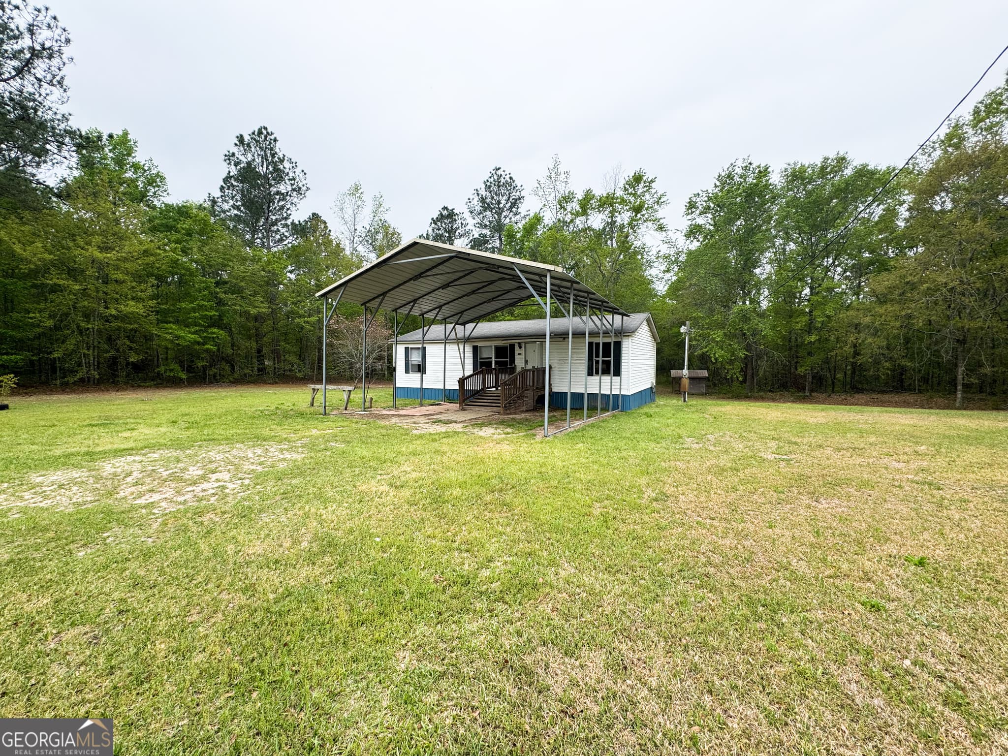 3 bedroom, 2 bathroom, 1,056 sq ft manufactured home,single family residence for sale at 877 W Rushing Road, Register, GA 30452