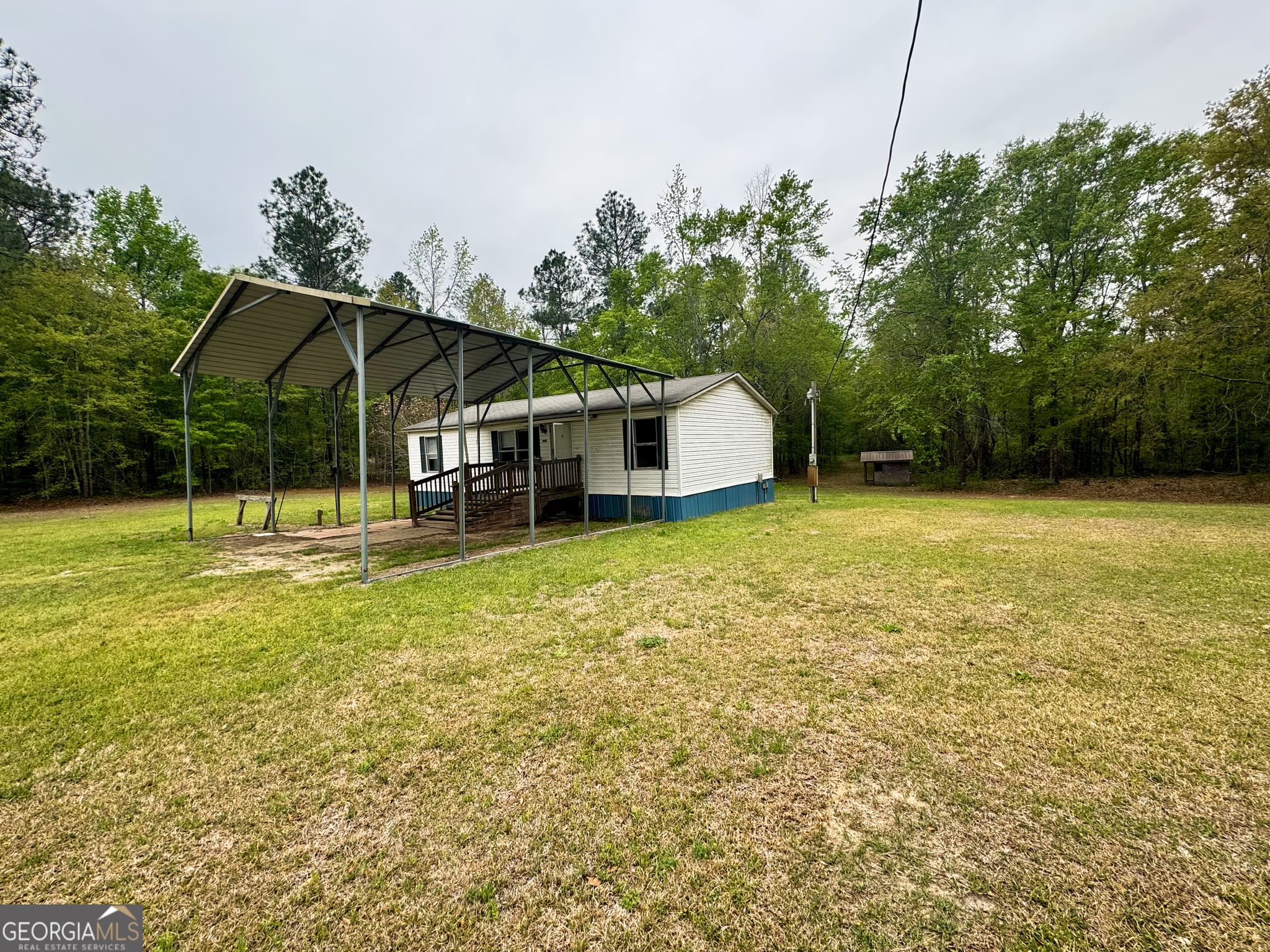 3 bedroom, 2 bathroom, 1,056 sq ft manufactured home,single family residence for sale at 877 W Rushing Road, Register, GA 30452 — photo 5