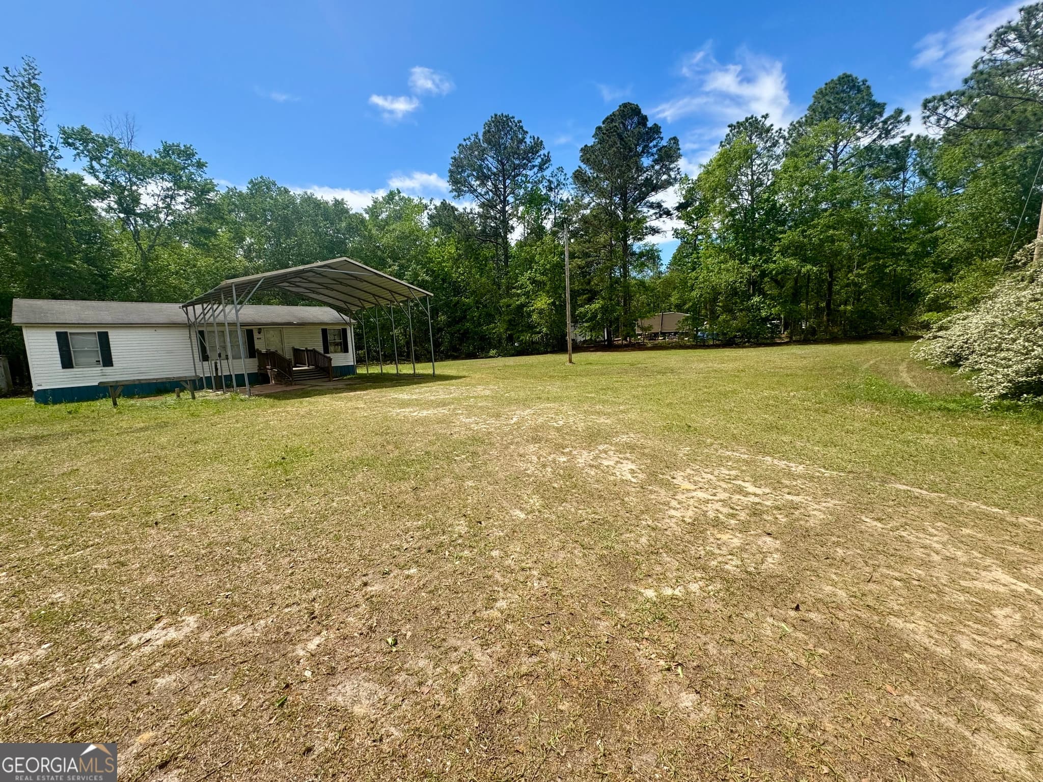 3 bedroom, 2 bathroom, 1,056 sq ft manufactured home,single family residence for sale at 877 W Rushing Road, Register, GA 30452 — photo 4
