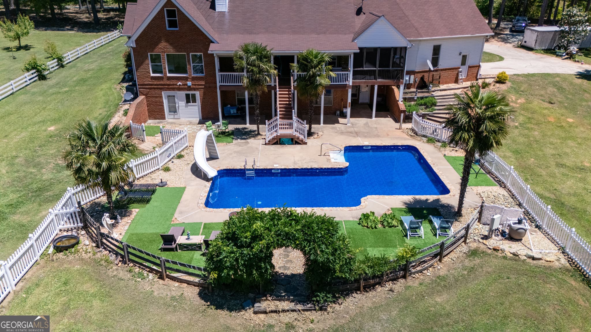 4 bedroom, 4.5 bathroom, 5,896 sq ft single family residence for sale at 1268 Welcome Road, Newnan, GA 30263 — photo 2