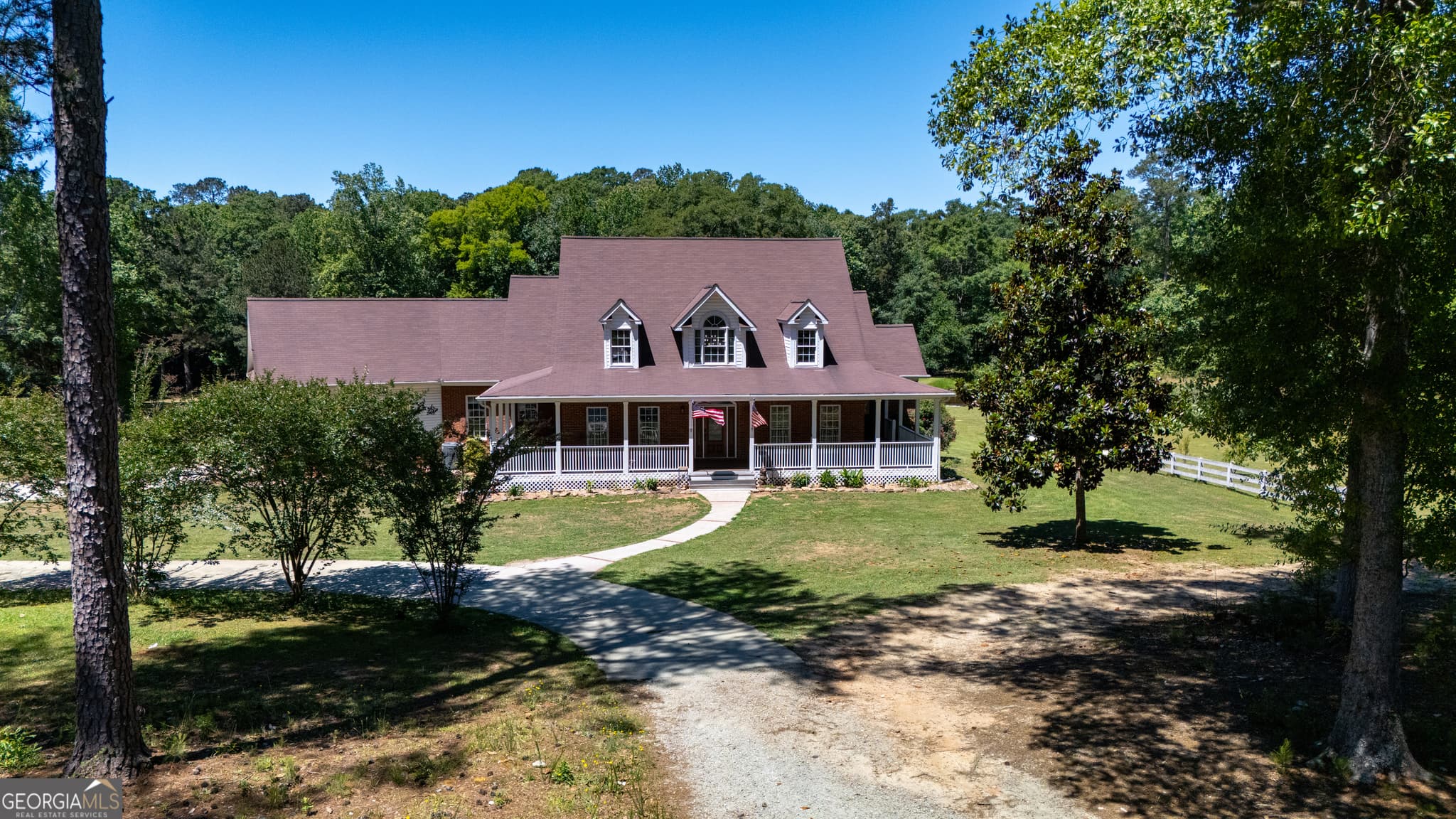 4 bedroom, 4.5 bathroom, 5,896 sq ft single family residence for sale at 1268 Welcome Road, Newnan, GA 30263 — photo 3