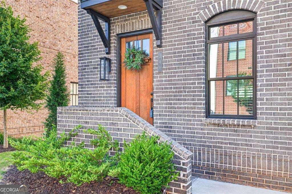 4 bedroom, 4.5 bathroom townhouse for sale at 340 Sugarview Road, Sugar Hill, GA 30518 — photo 2
