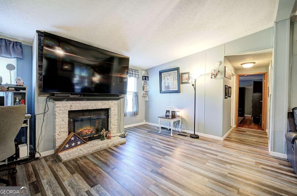 3 bedroom, 2 bathroom manufactured home,single family residence for sale at 1424 Abrams Road, Silver Creek, GA 30173 — photo 6