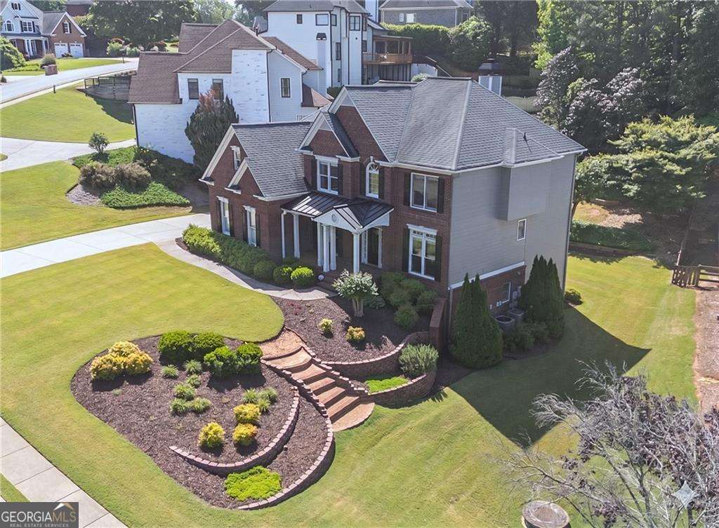 5 bedroom, 4.5 bathroom, 4,477 sq ft single family residence sold at 5390 Avonshire Lane, Cumming, GA 30040