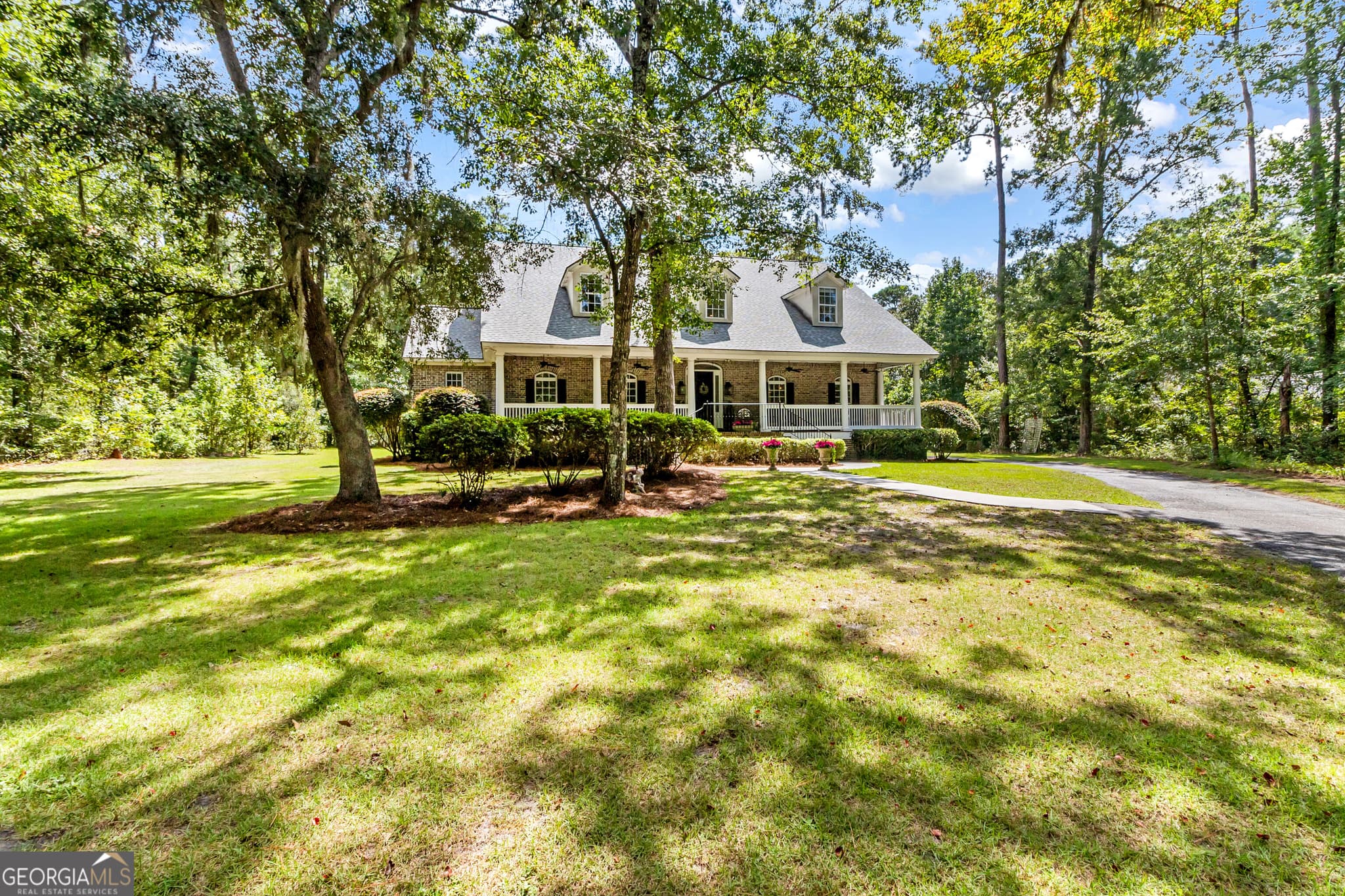4 bedroom, 5.5 bathroom, 6,468 sq ft single family residence for sale at 233 Buckland Hall Road, Richmond Hill, GA 31324 — photo 7