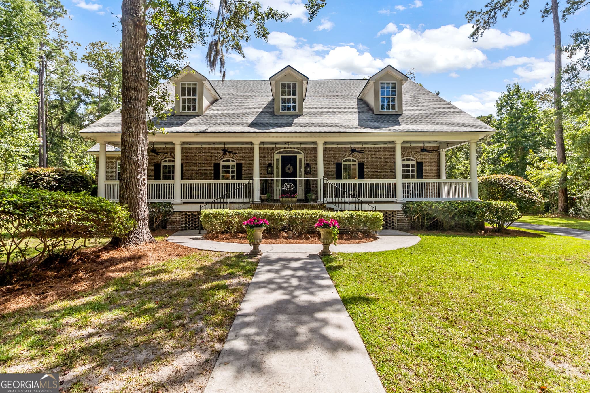 4 bedroom, 5.5 bathroom, 6,468 sq ft single family residence for sale at 233 Buckland Hall Road, Richmond Hill, GA 31324