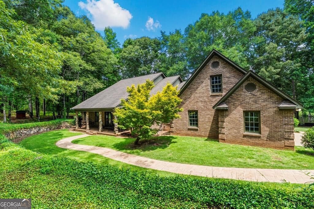 4 bedroom, 2.5 bathroom, 3,219 sq ft single family residence for sale at 877 Mckee Road, Waverly Hall, GA 31831 — photo 1 of 71