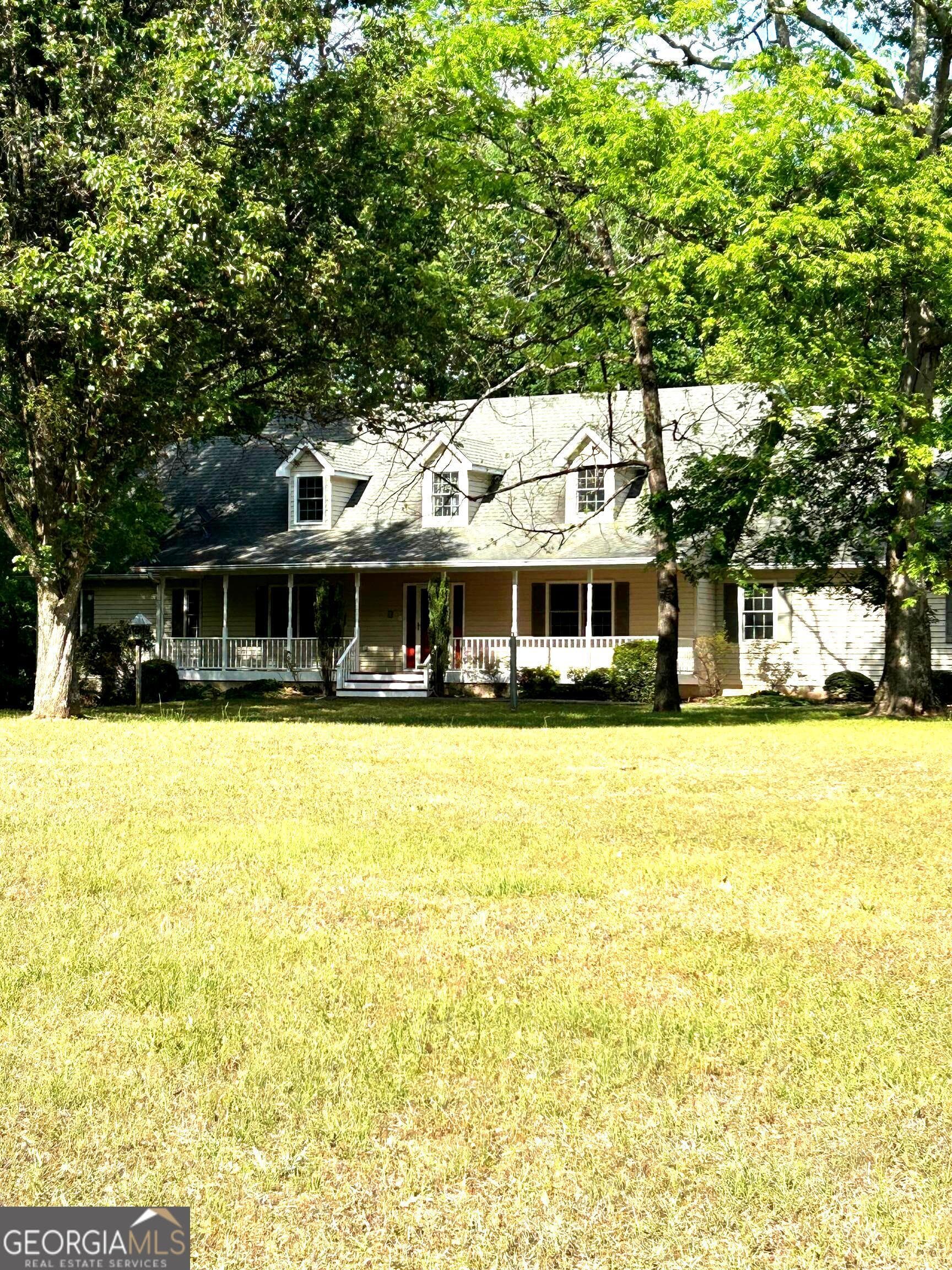 5 bedroom, 2.5 bathroom, 3,132 sq ft single family residence for sale at 4800 Bethlehem Road, Fairburn, GA 30213 — photo 2