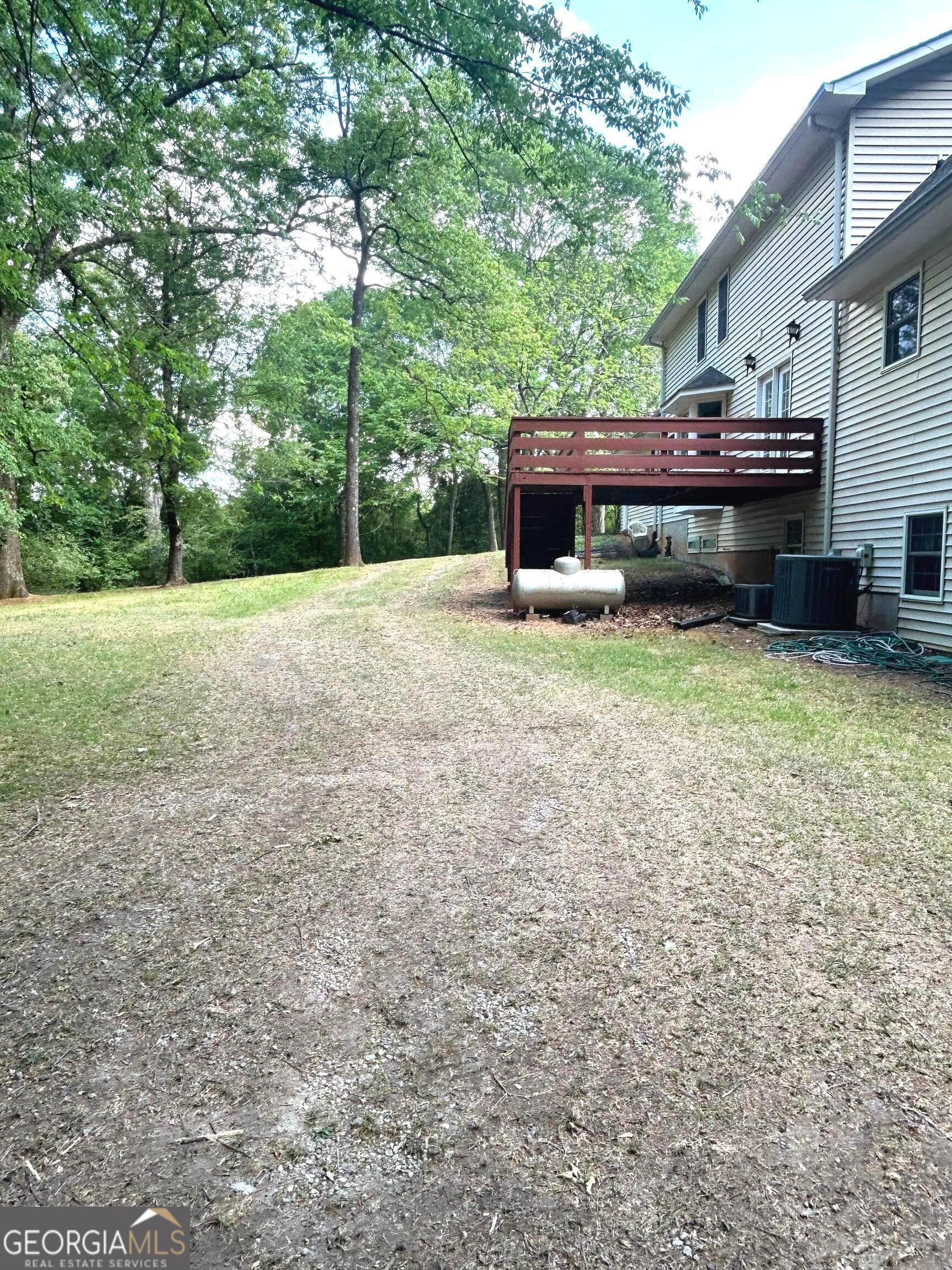5 bedroom, 2.5 bathroom, 3,132 sq ft single family residence for sale at 4800 Bethlehem Road, Fairburn, GA 30213 — photo 4