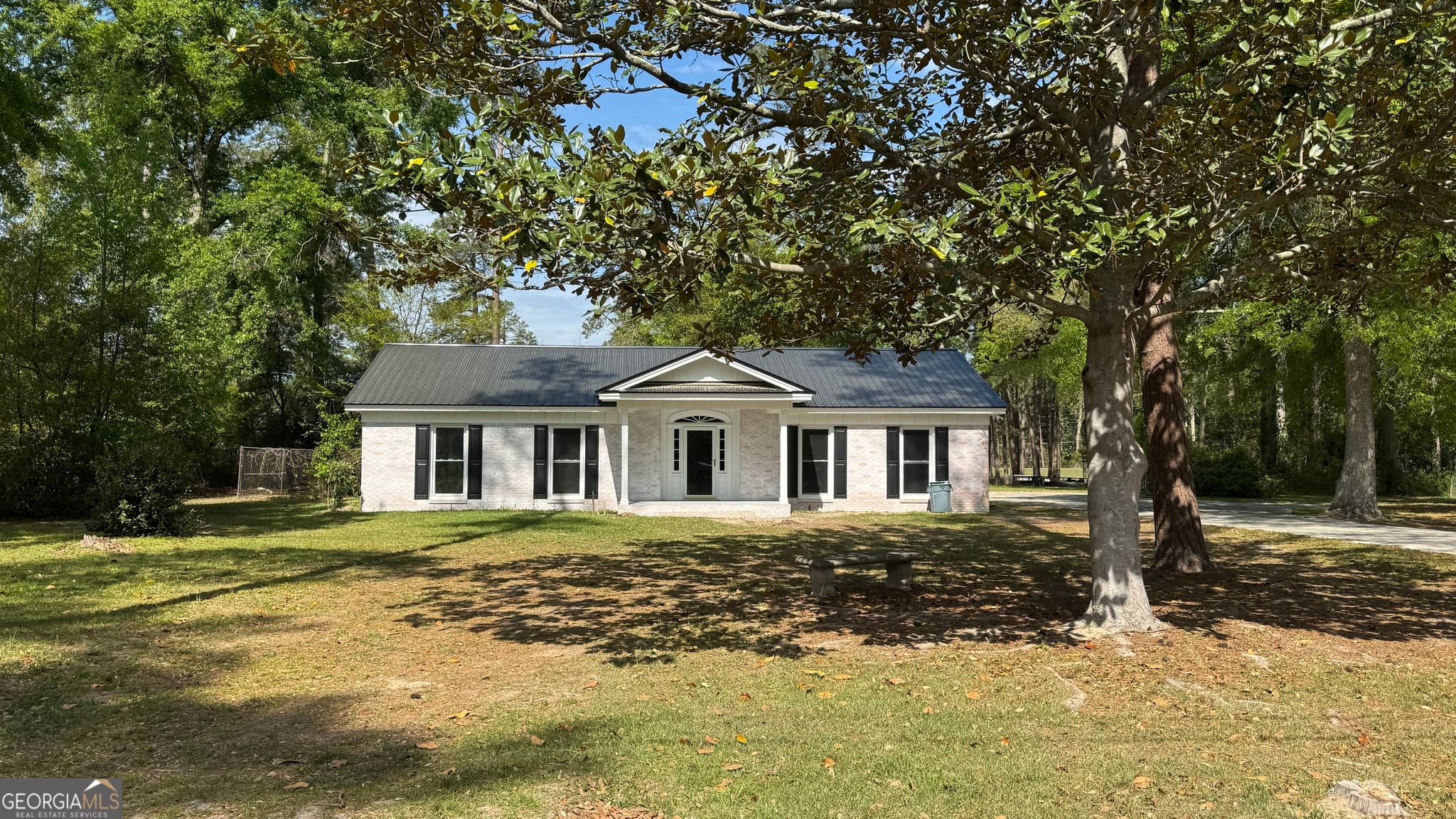 4 bedroom, 3 bathroom, 2,888 sq ft single family residence for sale at 123 Kennedy Street, Reidsville, GA 30453 — photo 2