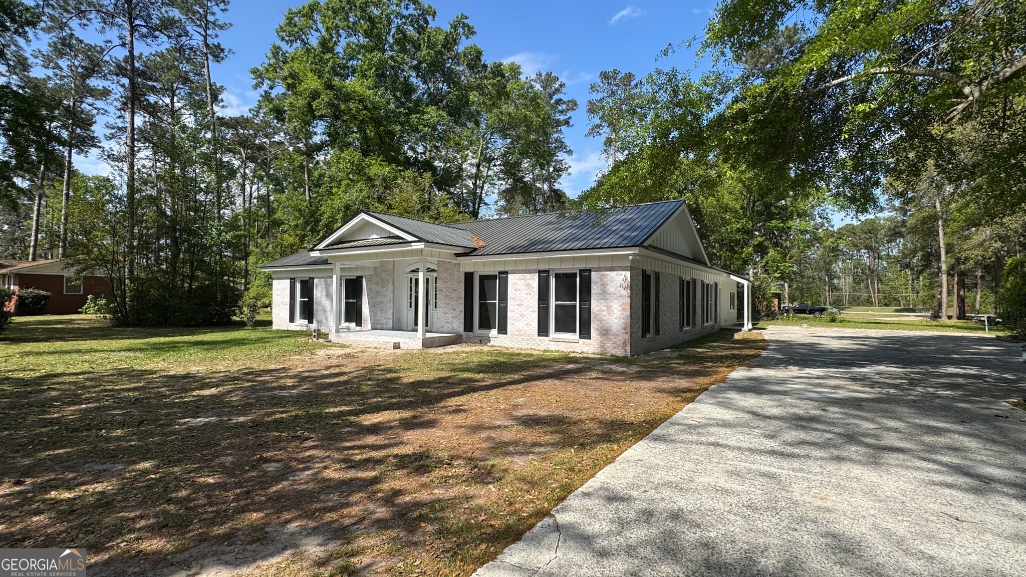 4 bedroom, 3 bathroom, 2,888 sq ft single family residence for sale at 123 Kennedy Street, Reidsville, GA 30453 — photo 3