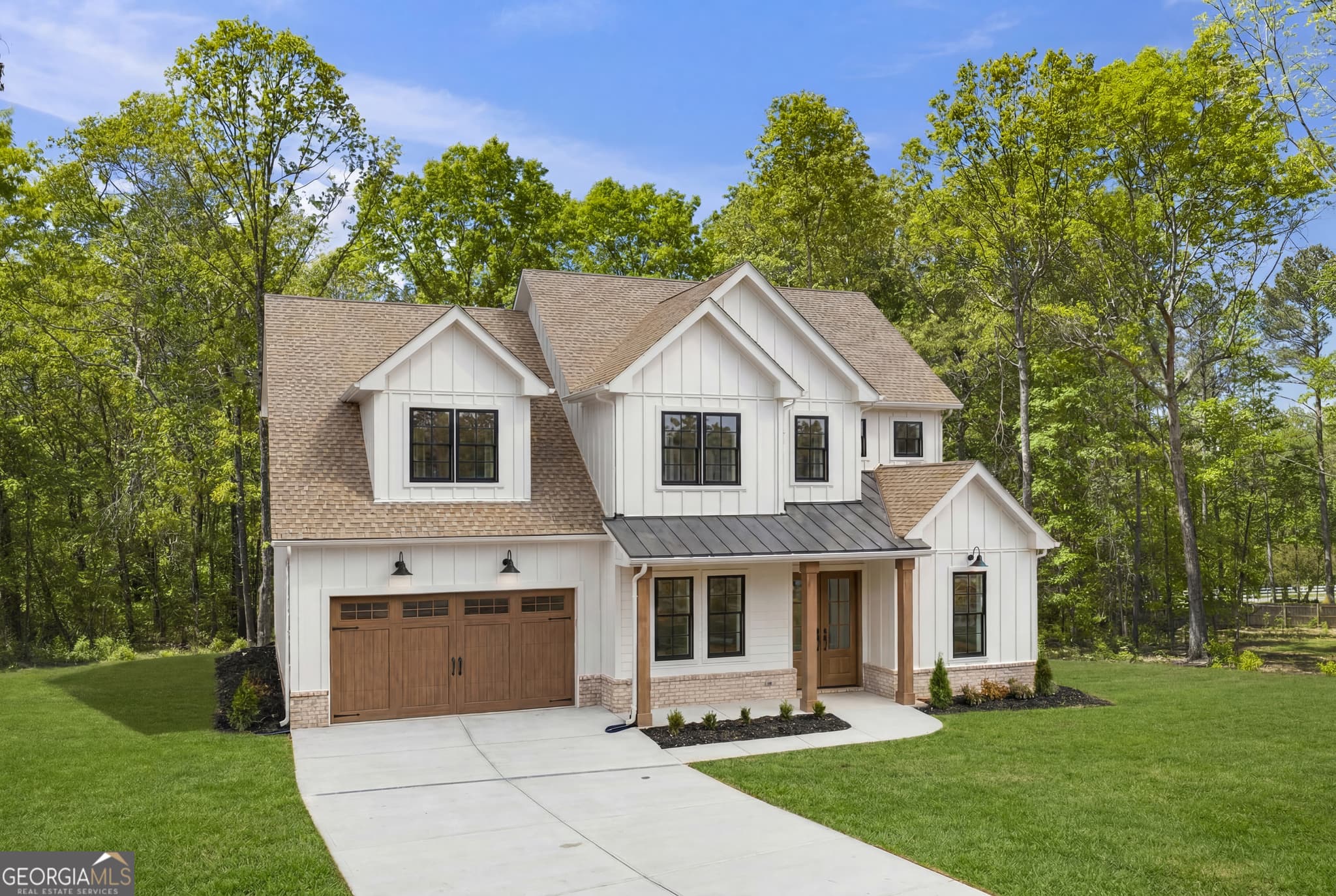 5 bedroom, 3 bathroom, 2,618 sq ft single family residence for sale at 6535 Riley Road, Cumming, GA 30028 — photo 2