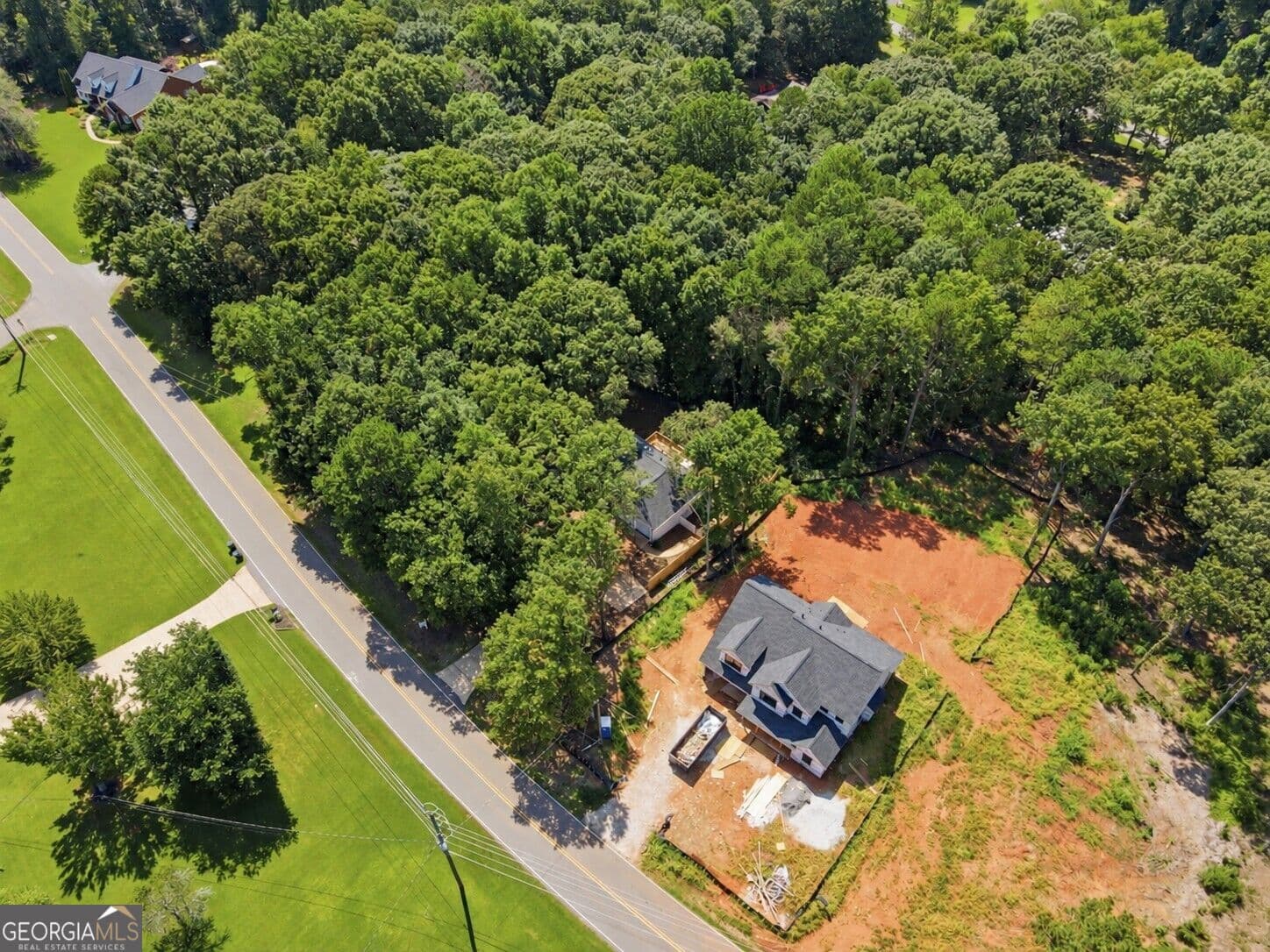 5 bedroom, 3 bathroom, 2,618 sq ft single family residence for sale at 6535 Riley Road, Cumming, GA 30028 — photo 3