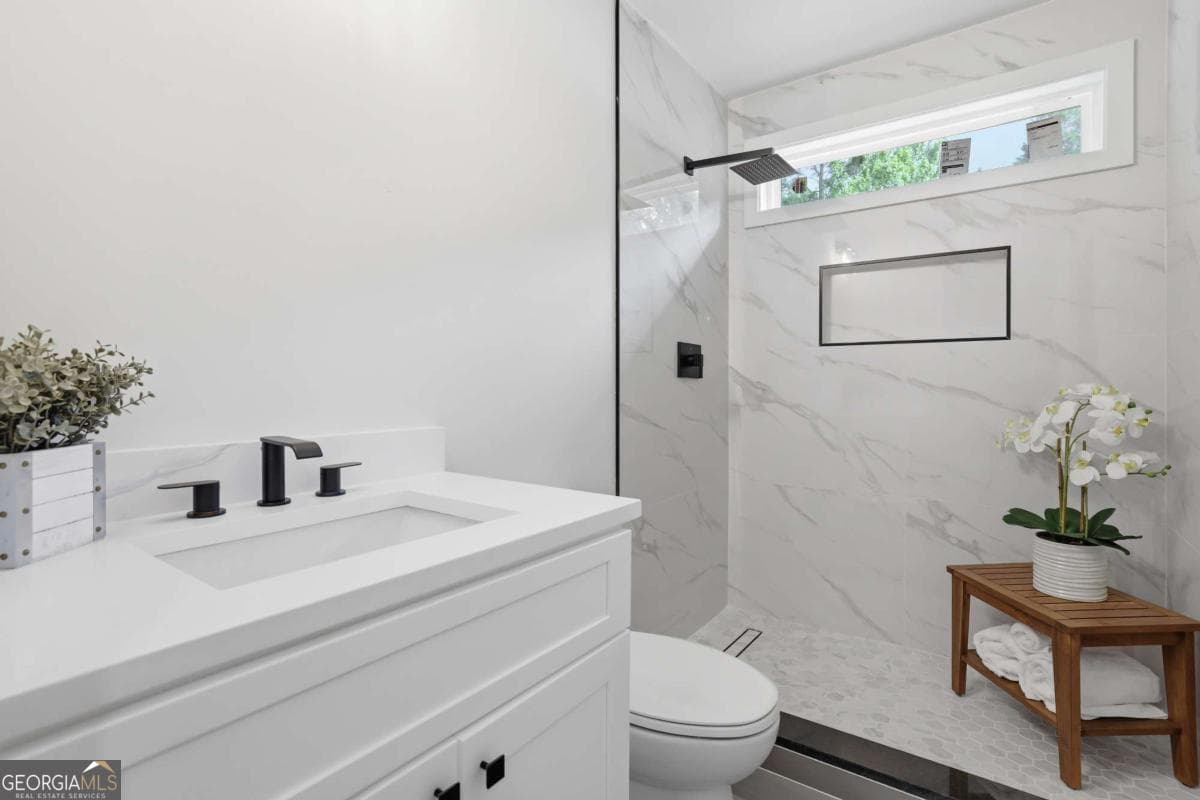 4 bedroom, 2.5 bathroom, 2,048 sq ft single family residence for sale at 2520 Conley Drive, Cumming, GA 30040 — photo 6