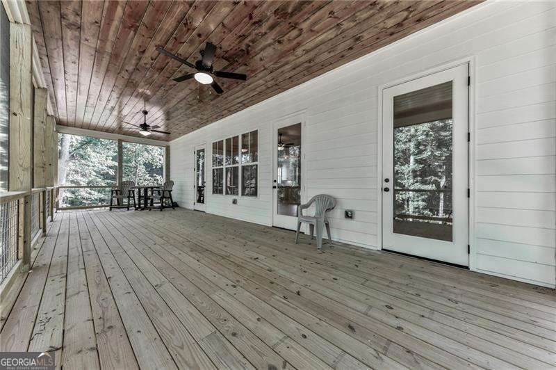 5 bedroom, 4.5 bathroom, 3,086 sq ft single family residence for sale at 1560 Howell Bridge Road, Ball Ground, GA 30107 — photo 6