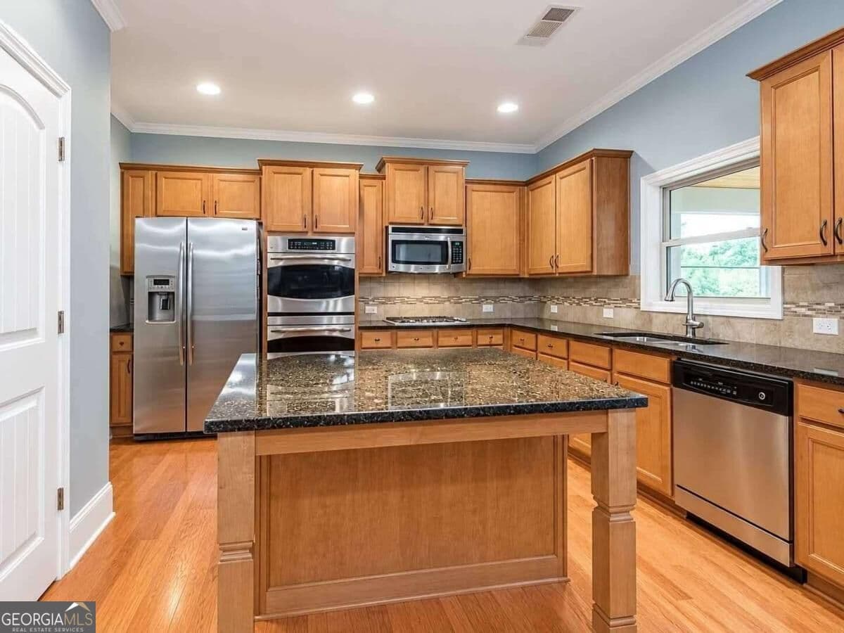 7 bedroom, 5 bathroom, 5,024 sq ft single family residence for rent at 5335 Chestnut Drive, Cumming, GA 30040 for $3,499 a month — photo 7