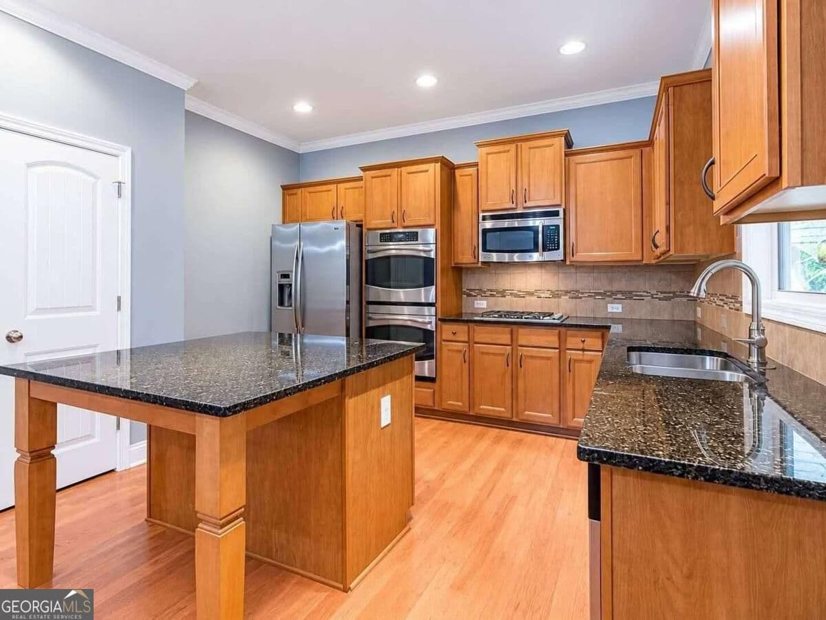 7 bedroom, 5 bathroom, 5,024 sq ft single family residence for rent at 5335 Chestnut Drive, Cumming, GA 30040 for $3,499 a month — photo 9