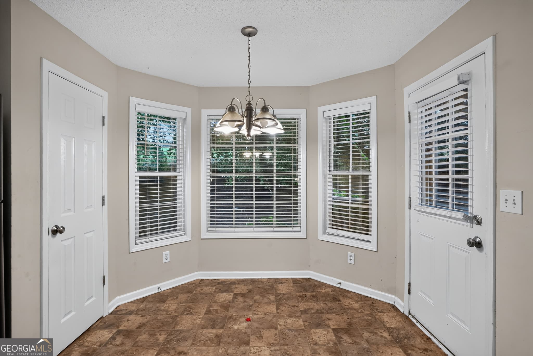 4 bedroom, 2.5 bathroom, 1,831 sq ft single family residence for sale at 709 Patriots Point Street, Locust Grove, GA 30248 — photo 6
